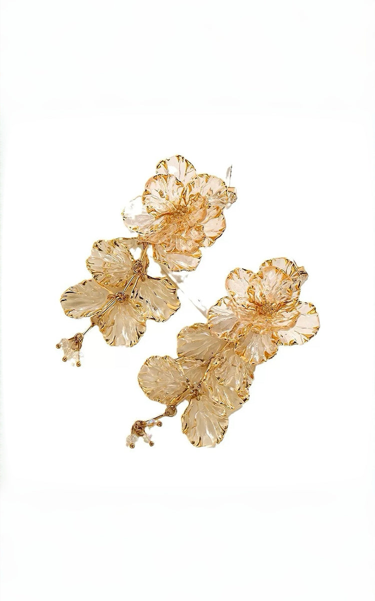 Yellow floral earrings on a white background