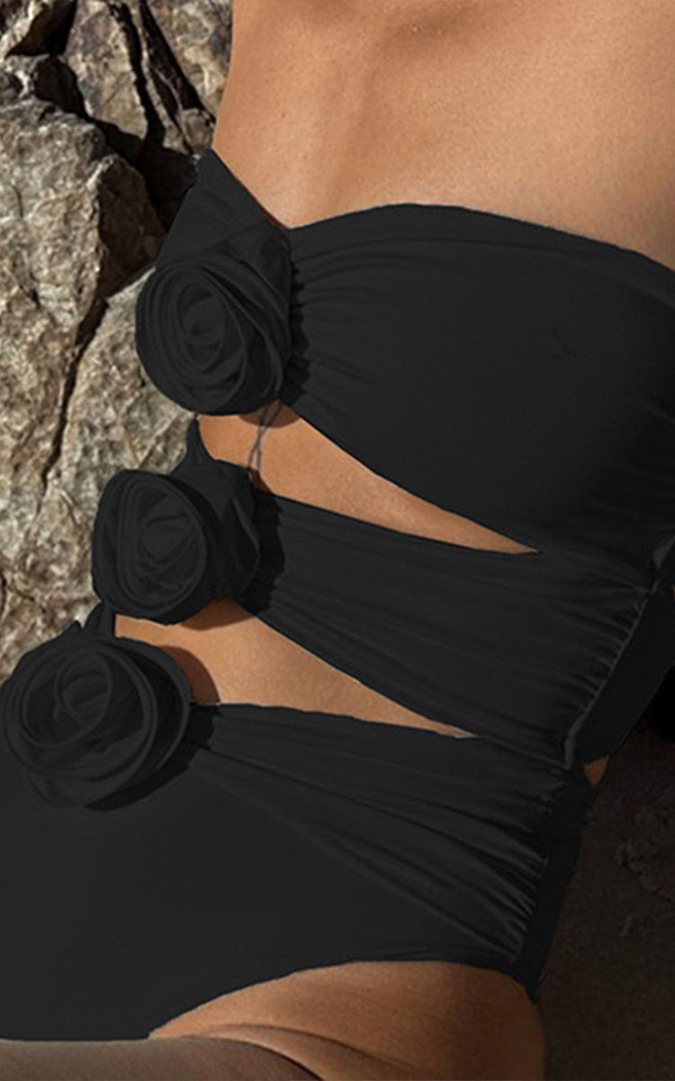 Model wears Black Off-Shoulder Rose Swimsuit